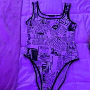 super cute newspaper print bodysuit